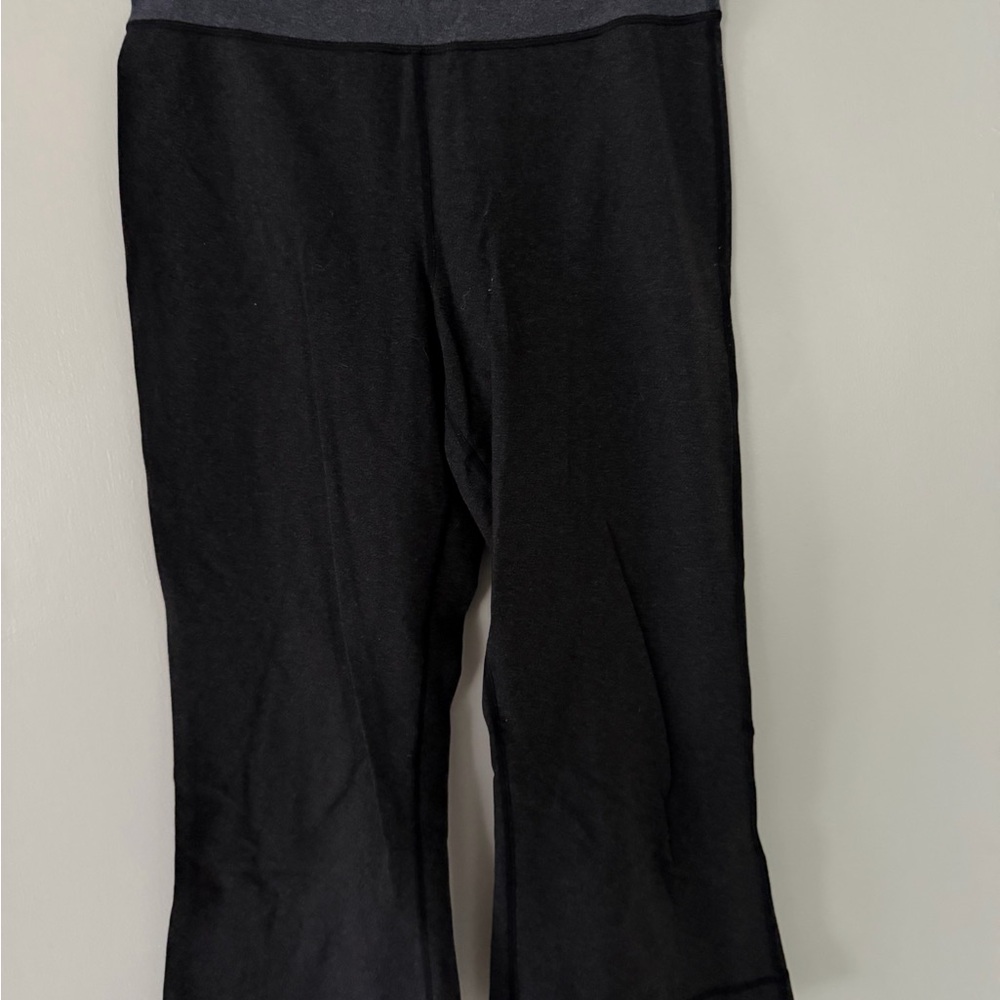 lululemon dark gray flared leggings with heather blue trim